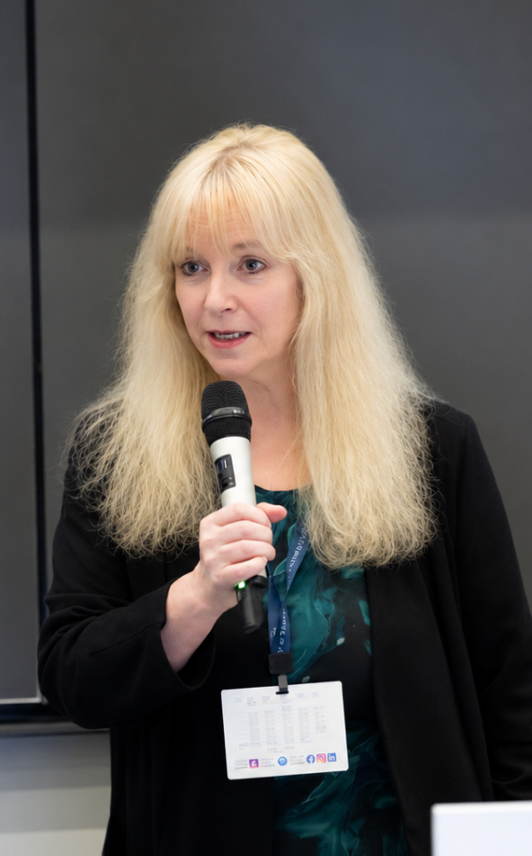 Dr Lorna Waddington speaking at an event